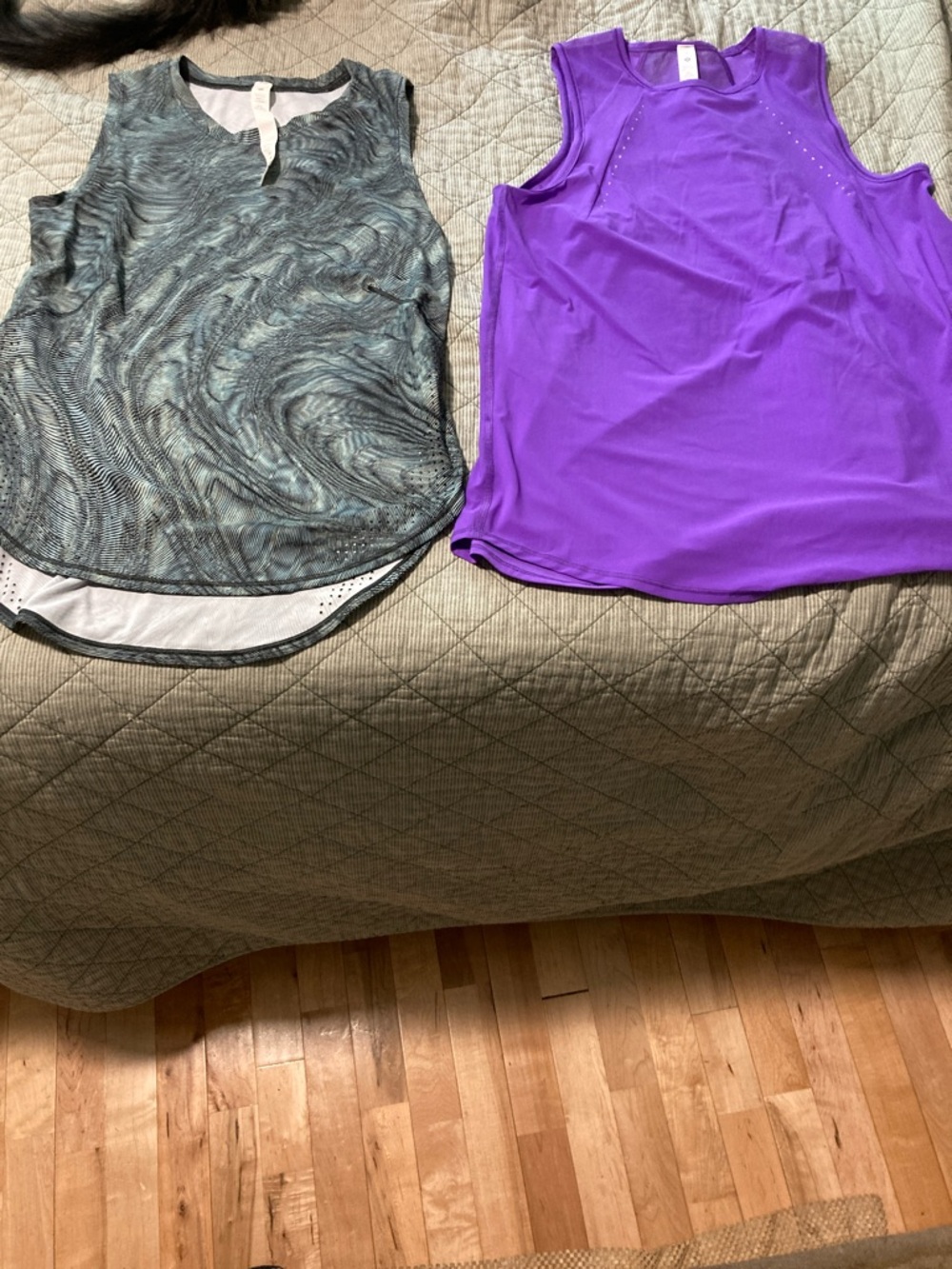 Bundle of two Lululemon sculpt tanks size 2
